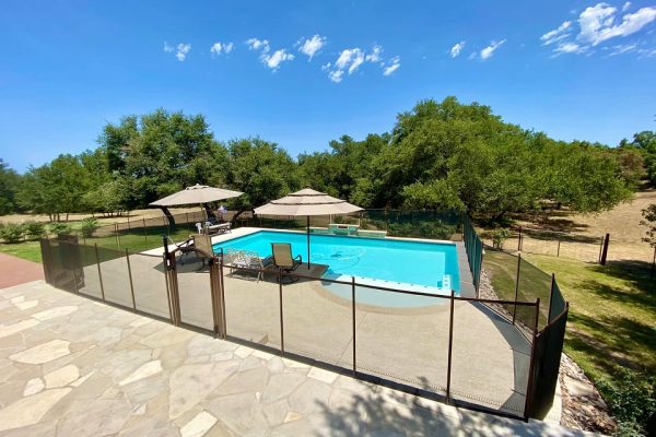 brown-mesh-pool-fence Fredericksburg Texas Pool Fence Installation